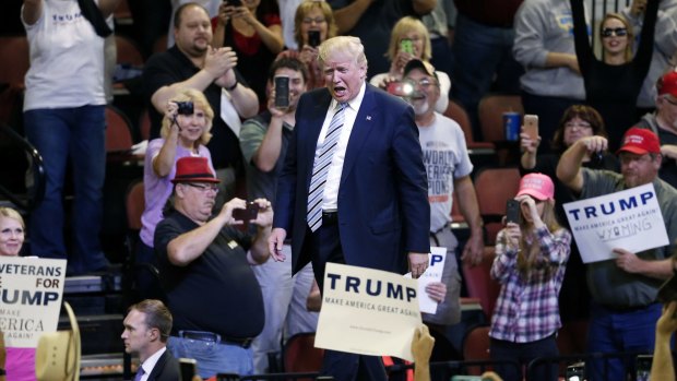 Trump greets supporters at a rally in Montana on Thursday. 