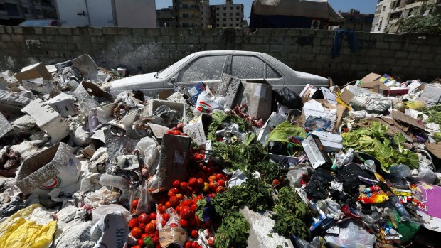 Garbage covered with white pesticide in the Palestinian refugee camp of Sabra in Beirut last week.