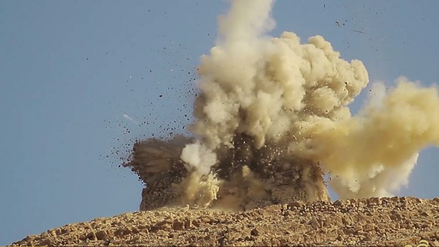 This undated photo shows one of two mausoleums blowing up by the Islamic State militants in the historic central town of Palmyra, Syria.