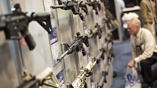 Rifles on display in the Colt's Manufacturing Co. booth at an NRA event in Tennessee in April. 