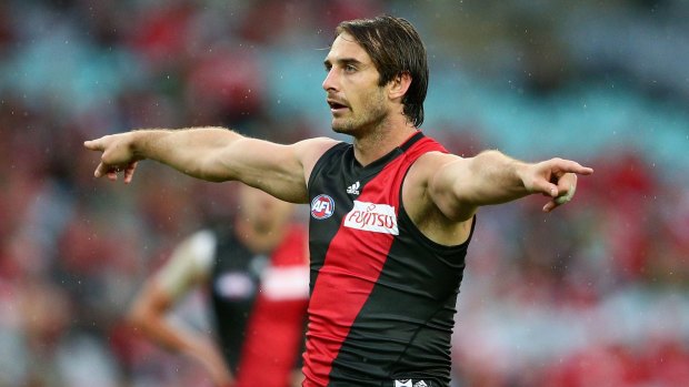 Essendon captain Jobe Watson signals to his teammates during the match against Sydney on Saturday.