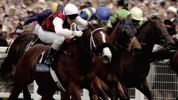 Jay Ford and Takeover Target (white cap) land The King's Stand Stakes at Ascot Racecourse in 2006.