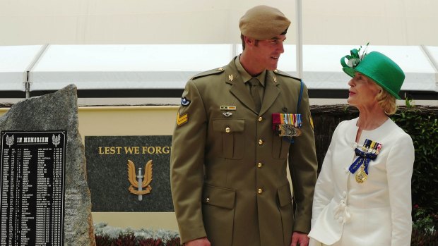 Roberts-Smith talks with then governor-general Quentin Bryce after being awarded the Victoria Cross in 2011.
