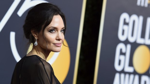 Angelina Jolie arrives at the 75th annual Golden Globe Awards at the Beverly Hilton Hotel on Sunday, Jan. 7, 2018, in Beverly Hills, Calif. (Photo by Jordan Strauss/Invision/AP)