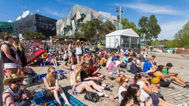Crowds at Federation Square to watch the grand final.