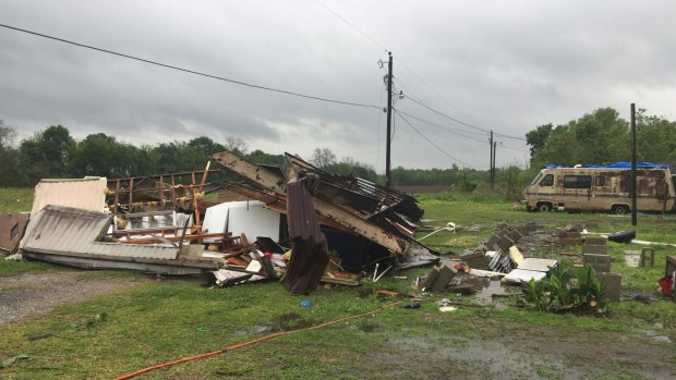 The remains of a trailer lie where a woman and her three-year-old daughter were killed when a severe storm in Breaux Bridge, Louisiana, flipped it.