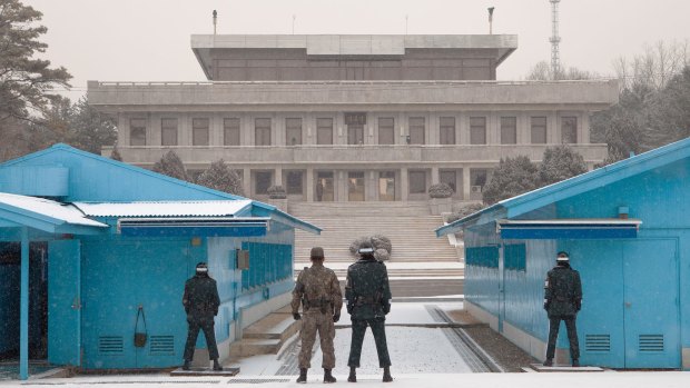 Soldiers stand guard at the Joint Security Areabetween North and South Korea. The JSA was created in 1953 as a neutral area inside the Demilitarised Zone (DMZ) for negotiating peace agreements between North and South Korea.