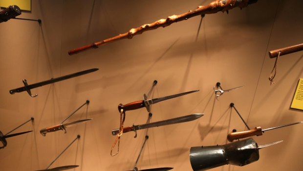 Assorted knives and weapons illustrate the reality of hand-to-hand fighting in the trenches.