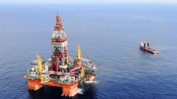 The Haiyang Shiyou oil rig, the first deep-water drilling rig developed in China, is pictured at 320 kilometers south-east of Hong Kong in the South China Sea. 