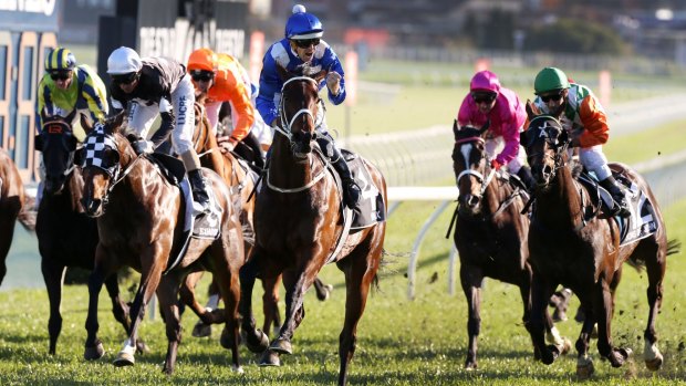 Out for eight: Hugh Bowman wins the Epsom on Winx.
