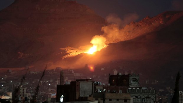 A Saudi-led air strike hits a site believed to be one of the largest weapons depots on the outskirts of Yemen's capital, Sanaa, last week.