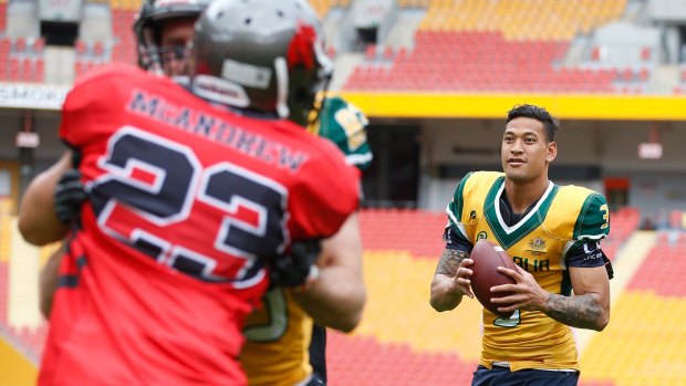 Playmaker: Israel Folau does his best Peyton Manning impersonation. 