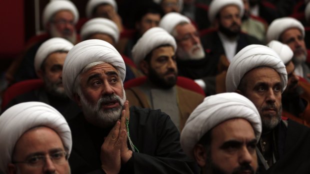 Lebanese Shiite clerics listen via video-link to their leader, Sheik Hassan Nasrallah, who condemned Saudi Arabia for executing prominent Saudi opposition Shiite cleric Nimr al-Nimr.