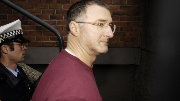 Potter in Tasmanian police custody in 2008.