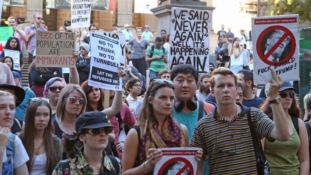 Demonstrators protest against Trump's ban in Melbourne on Friday.