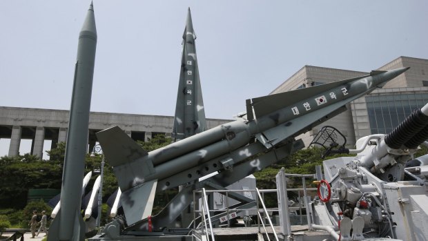 South Korea's mock missiles are displayed next to North Korea's mock Scud-B, left, at the Korea War Memorial Museum in Seoul, South Korea.