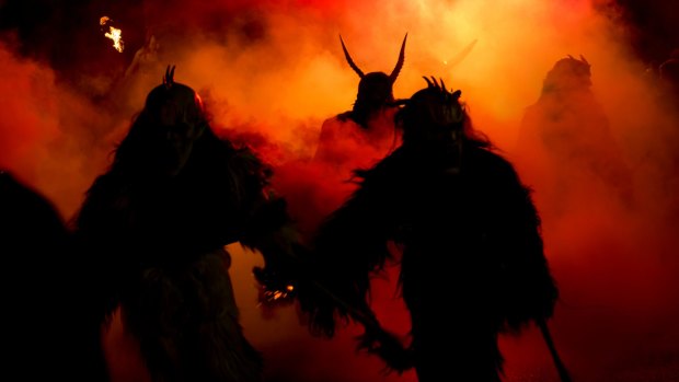 Krampus figures terrorize the streets during a December 5 parade.