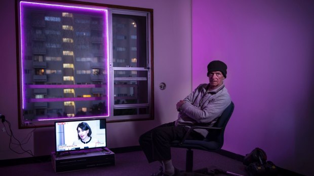 Henry Wilson in his apartment under threat in the Waterloo public housing tower. 