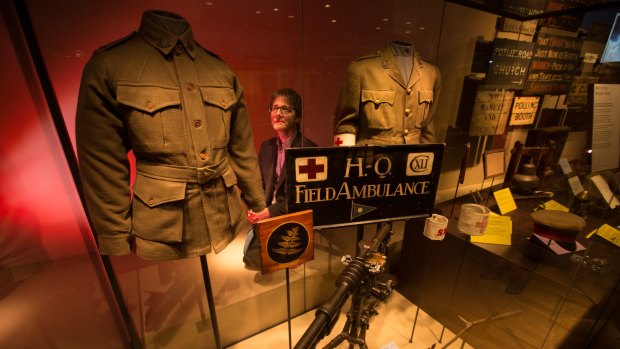 Personal items: Nigel Steel, principal historian at the Imperial War Museum, examines the uniform of Private Robert Tuckerman.