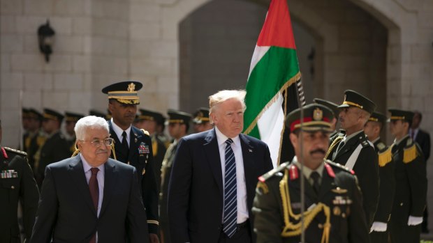 Palestinian Authority president Mahmoud Abbas and US President Donald Trump review an honour guard in the West Bank city of Bethlehem.
