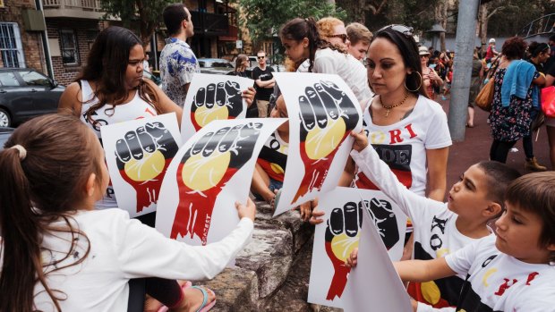 Marchers gather for the Invasion Day rally at The Block in Redfern. 