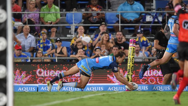 Tyler Cornish scores a try on debut for the Gold Coast Titans.
