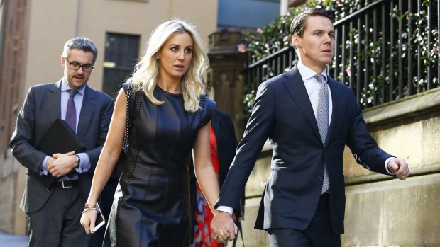 Jacenko with husband Oliver Curtis during the insider trading trial in May.