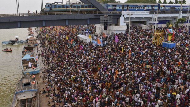 Devotees attend the Maha Pushkaralu, a Hindu festival, on the banks of river Godavari in Andhra Pradesh, India, this month.