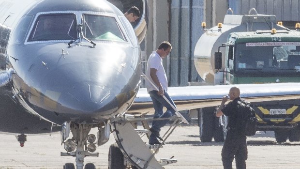 Joesley Batista exits a Federal Police plane in Brasilia, on Monday. The Brazilian tycoon who turned JBS into a global meat powerhouse turned themselves into police custody on Sunday