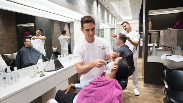 Manscaping in transit: Etihad's lounge barbershop.