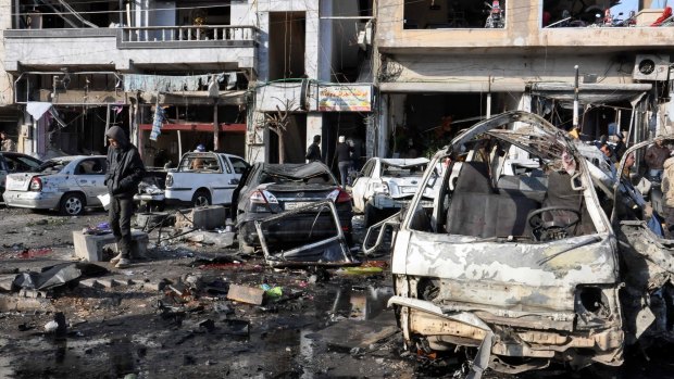 At least 24 people were killed by the two bombs at a government-run security checkpoint in Homs province, Syria.