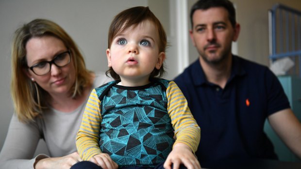 Clementine Ritchie-Barnes with her parents, Emily Ritchie and Lachlan Barnes at the Royal Children's Hospital.  