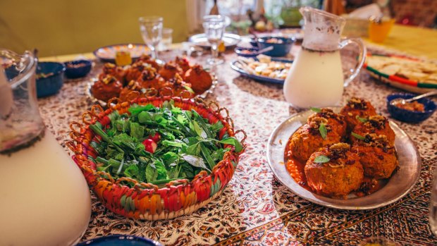 Koofteh (Persian meatballs) and doogh (traditional yogurt drink), served at a Persian cooking class in Tehran.