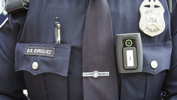 Officer Daniel Enriquez, equipped with a body camera, in Seattle on April 24, 2015. 