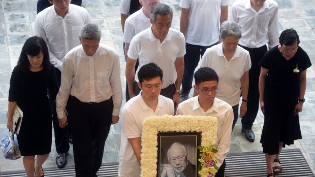 PM Lee Hsien Loong, centre, with siblings Lee Hsien Yang, second from left, and Lee Wei Ling, far right, at their father Lee Kuan Yew's state funeral in 2015.