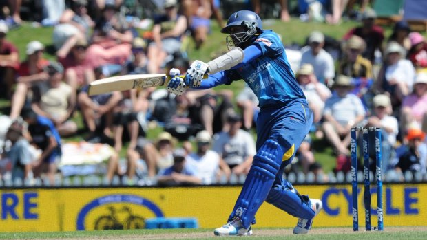 Sri Lanka's Tillakaratne Dilshan swings a ball to the boundary during his knock of 91.