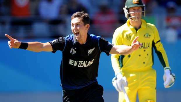 Lightning Boult strikes: New Zealand's Trent Boult celebrates taking the wicket of Australia's Mitchell Marsh.