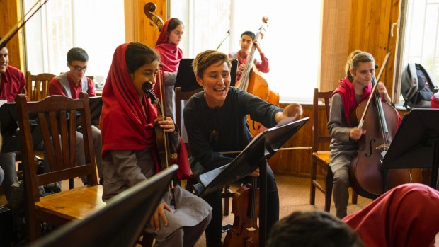 Ayres at Kabul’s Afghanistan National Institute of Music in June. When he arrived in 2015, he was startled by how much it bothered him when students called him “Miss Emma”: “I’d weep at being stuck in this female body.”