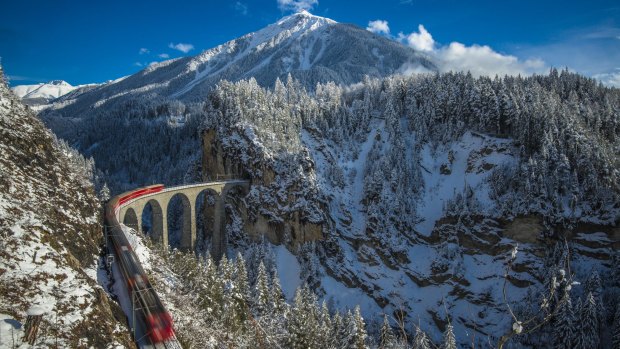 Passengers can enjoy the sights of Switzerland's Alpine terrain by train.
