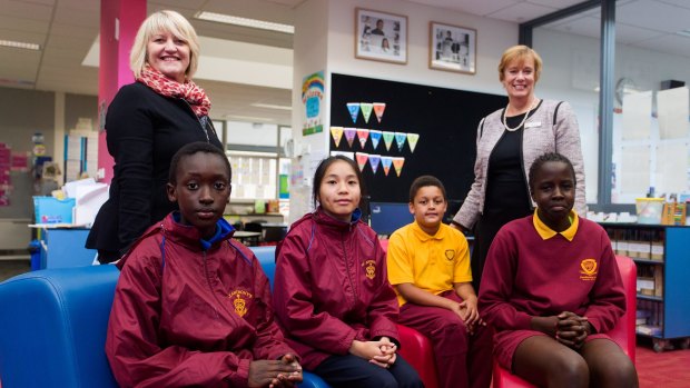 St Anthony's Primary Students (L-R) Emanuel, 11, Anna, 12, and Dandenong West Primary students Zavier, 11, and Adau, 11 with St Anthony's principal Marg Batt (L) and Dandenong West principal Bev Hansen.

The two schools are collaborating on a range of academic programs.

Photo Paul Jeffers
The Age NEWS
14 May 2015