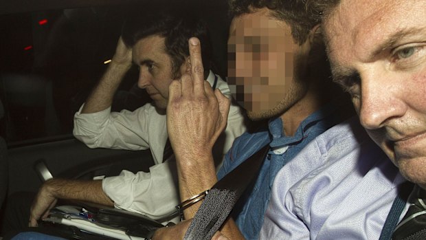 Sean Christian Price, centre, has been charged with raping a woman two days after murdering Masa Vukotic.