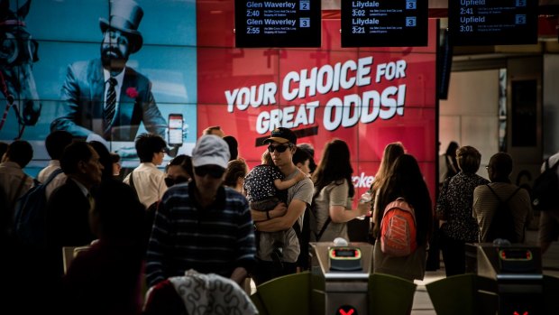 Gambling advertising at Melbourne's Flinders Street Station.