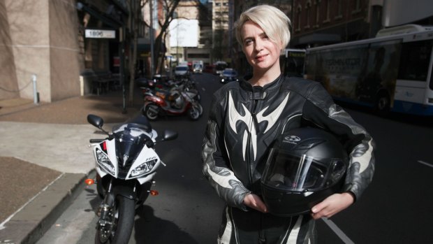 Kate Rothwell saves money and time riding her bike to work.
