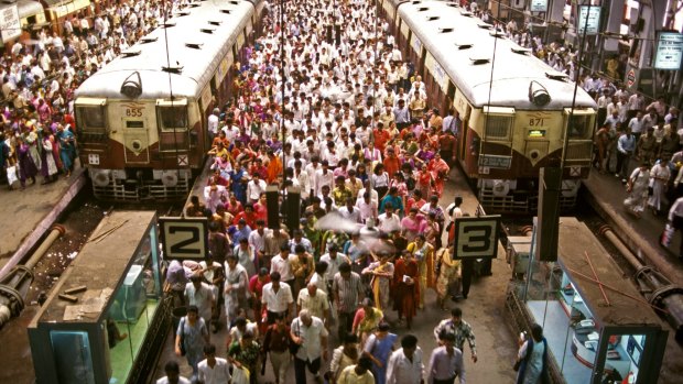 Rush hour commuters at busy Churchgate terminus on a normal day in Mumbai.