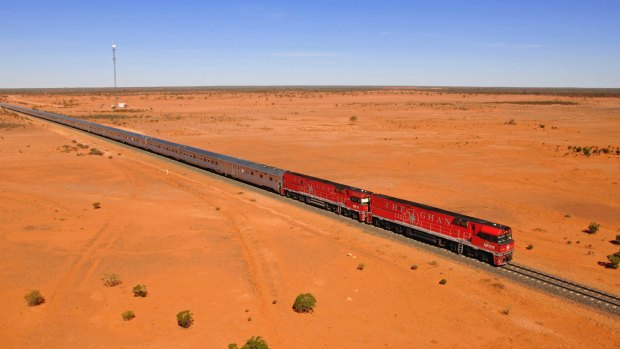 The Ghan going through the Outback desert