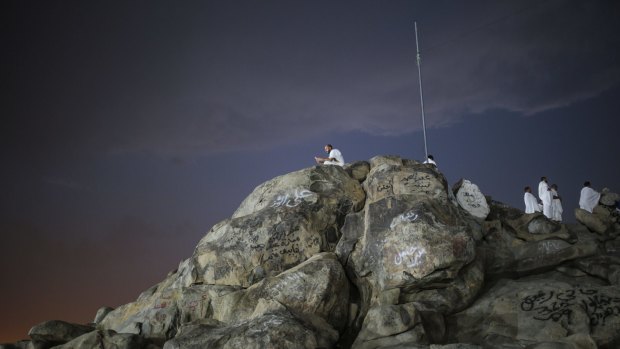 Muslim pilgrims pray on a rocky hill called the Mountain of Mercy, near the holy city of Mecca, where the prophet Muhammad is believed to have delivered his last sermon nearly 1400 years ago.