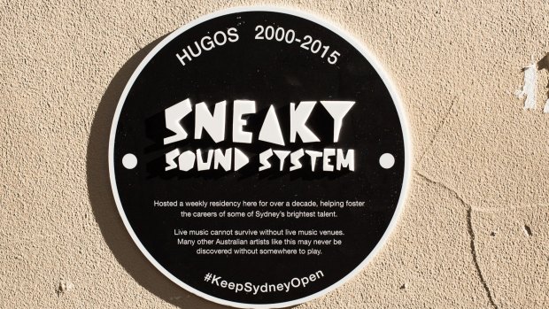 Memorial plaque outside the old Hugo's Lounge, in Kings Cross, where Sneaky Sound System played live music. 