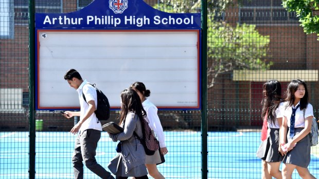 Students from Arthur Phillip High School in Parramatta leaving school on Tuesday.
