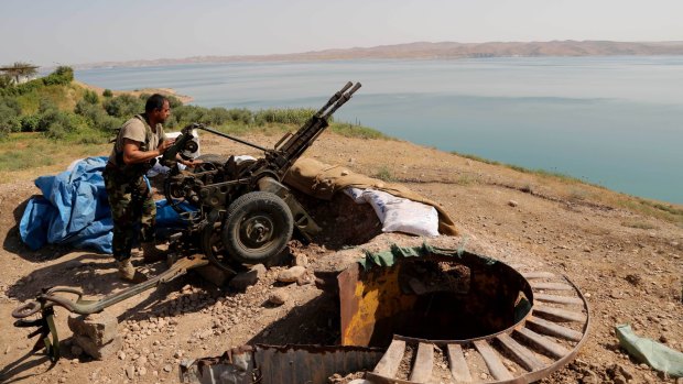 A Kurdish peshmerga outside Mosul, Iraq, in 2014.