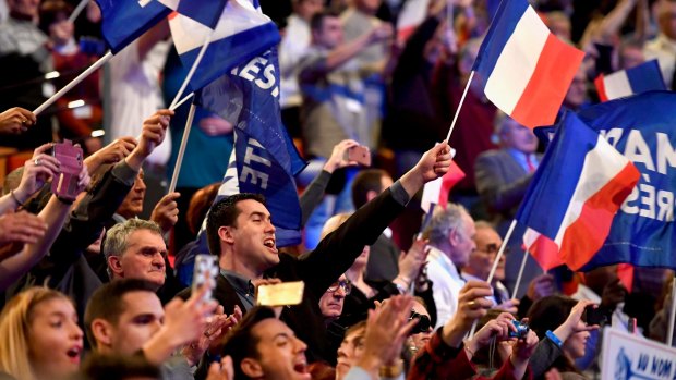 Far right supporters attend the launch of National Front Leader Marine Le Pen presidential campaign.